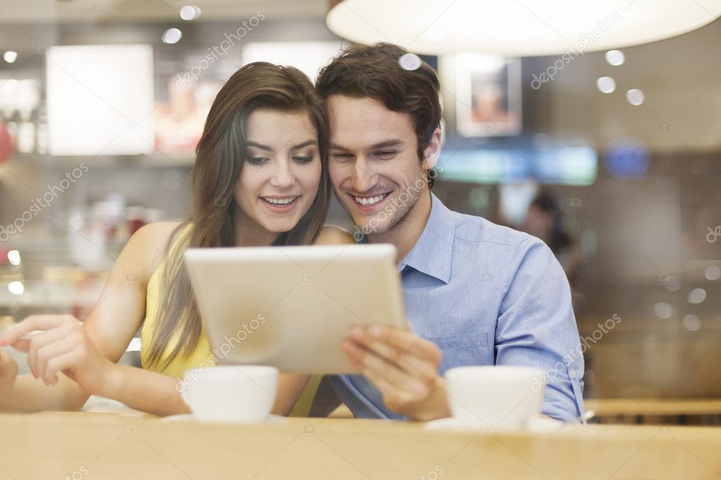 Couple  with digital tablet