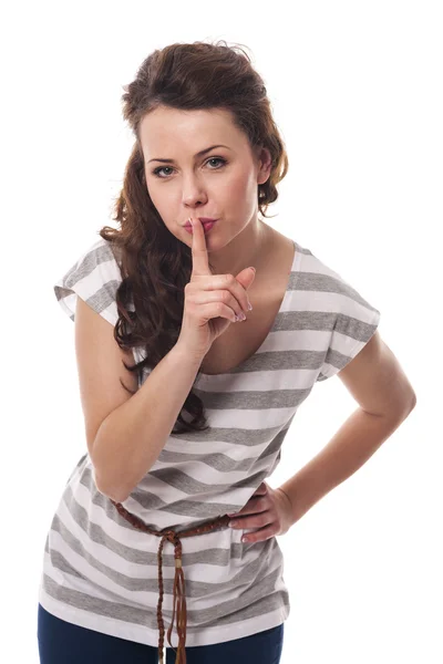 Woman with finger on lips — Stock Photo, Image