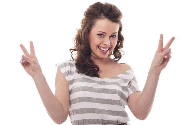 Woman gesturing peace sign — Stock Photo, Image