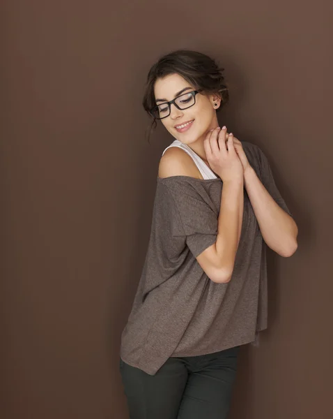 Woman on brown wall — Stock Photo, Image