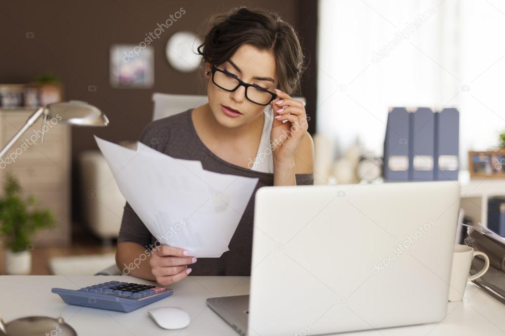 Woman hard working at home