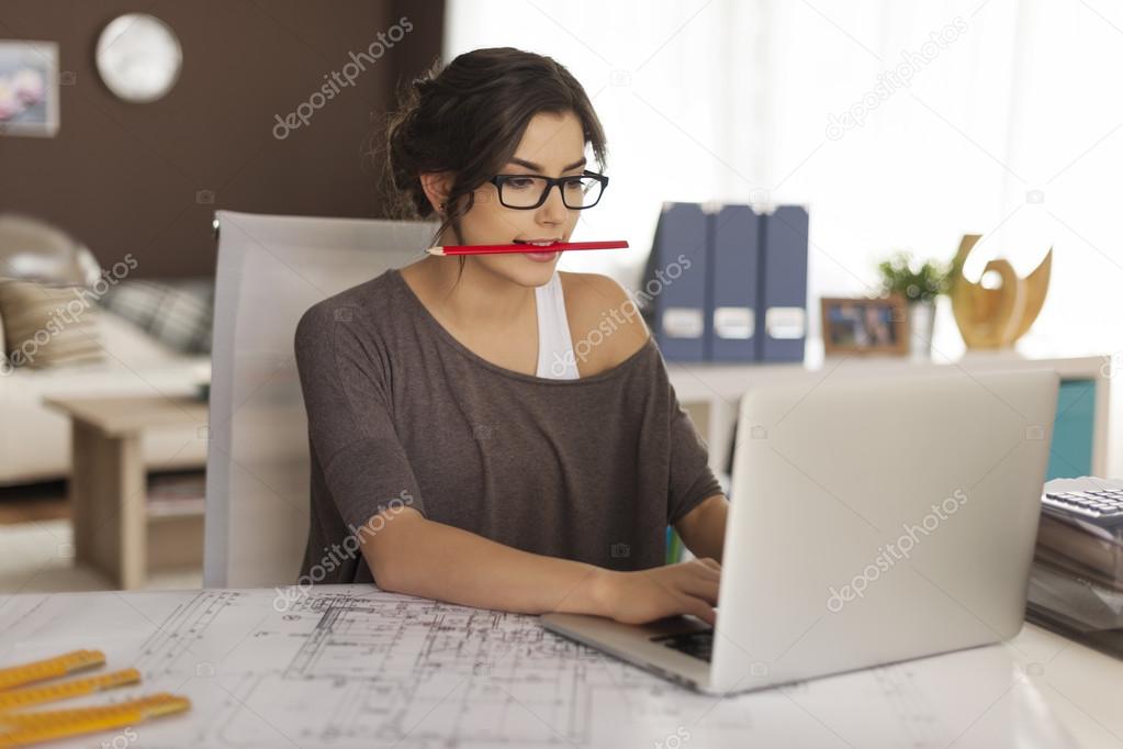 Young architect working at home