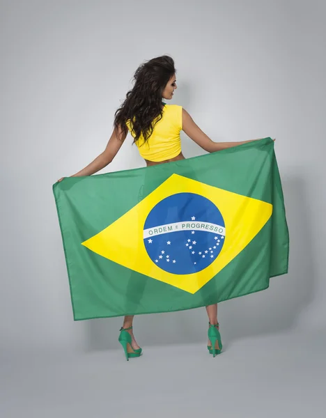 Mulher sexy com bandeira brasileira — Fotografia de Stock