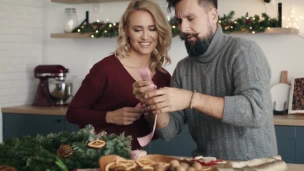 Adult Couple Making Christmas Decorations Together Shot Red Helium Camera — Stock Video