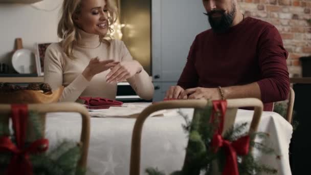 Adult couple making Christmas decoration at the table. Shot with RED helium camera in 8K — Stock Footage Adult Couple Making Christmas Decoration Table Shot Red Helium Camera Royalty Free Stock Footage