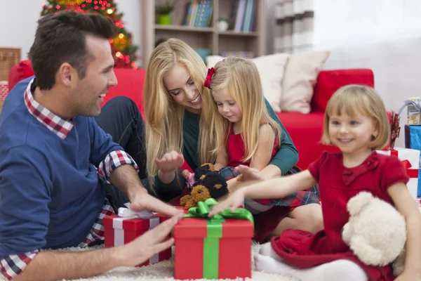 Happy family during Christmas time Royalty Free Stock Images