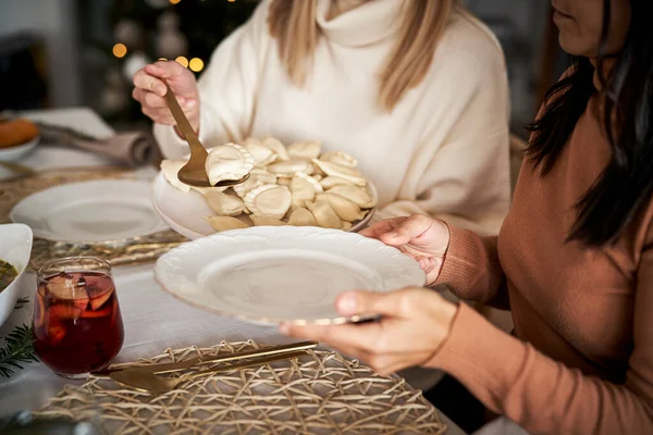 Women Sharing Dumplings Christmas Eve — Stock Photo, Image