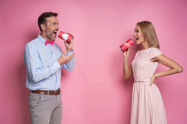 Caucasian Couple Pretending Phone Call Cans — Stockfoto