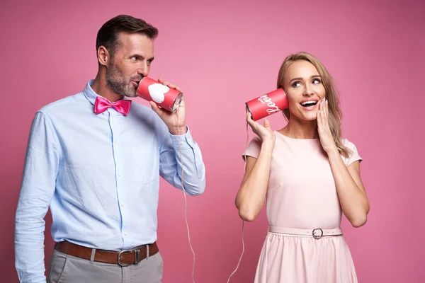 Caucasian Couple Pretending Phone Call Cans — Fotografia de Stock