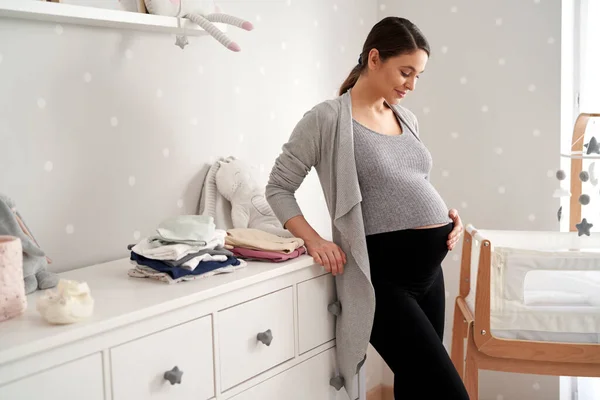 Thoughtful Caucasian Woman Advanced Pregnancy Standing Baby Room Next Crib — Stock Photo, Image