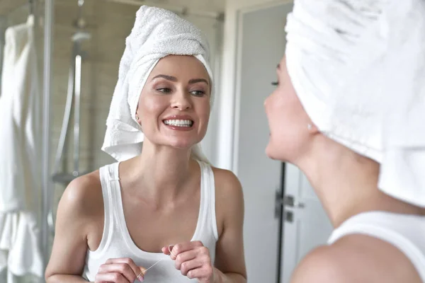 Close Young Caucasian Woman Checking Teeth Cleaning Dental Floss — стоковое фото