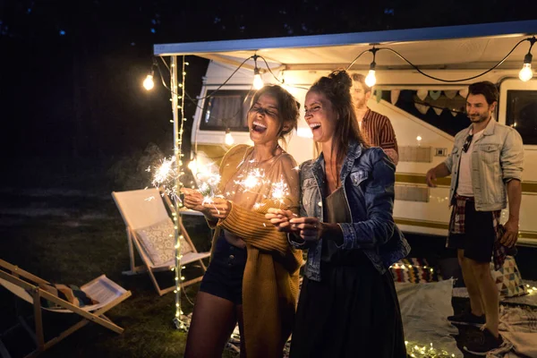 Happy Friends Enjoying Time While Holding Sparklers — Foto de Stock