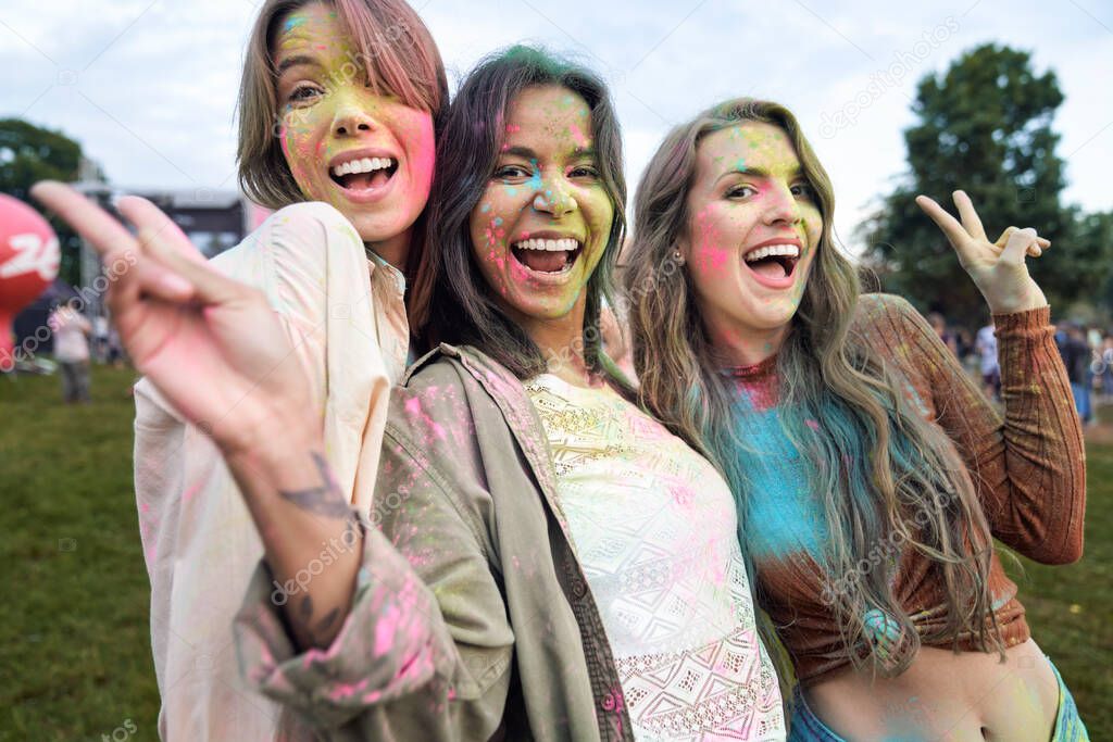Portrait of friends have fun at Holi Festival 