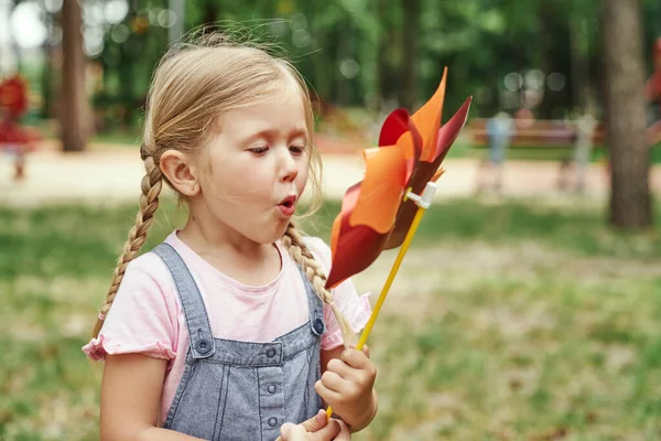 Cute Little Girl Blowing Windmill Windmill — Foto de Stock