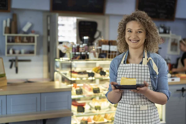 Portrait Young Waitress Cafe Holding Piece Cheesecake — Zdjęcie stockowe