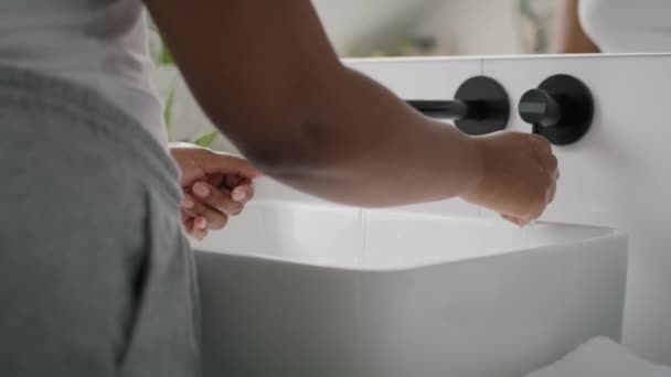 Close African American Person Washing Hands Sink Using White Towel — Stockvideo