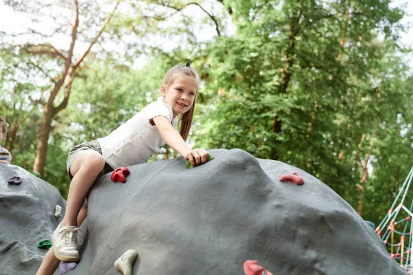 Blonde Girl Climbing Playground Summer Day — Stockfoto