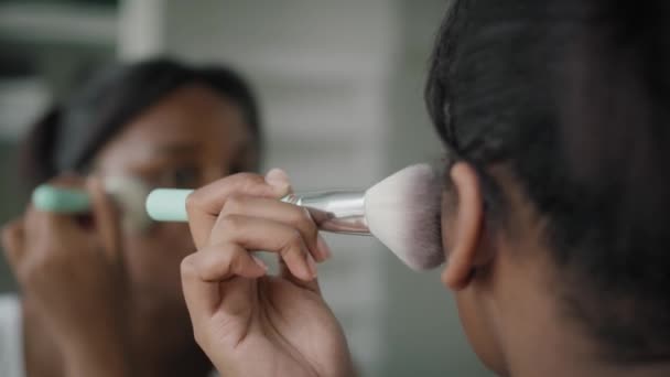 African American Woman Applying Make Blusher Bathroom Shot Red Helium — Stok video