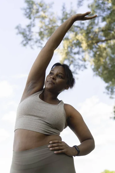 Sized African American Woman Stretching Park Summer Day — Stockfoto