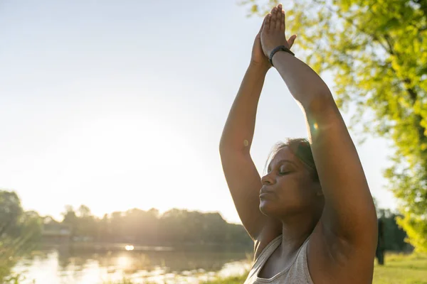 African American Woman Practicing Yoga Park — стоковое фото