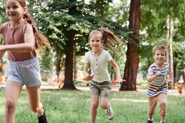 Group Kids Running Summer Day — стоковое фото