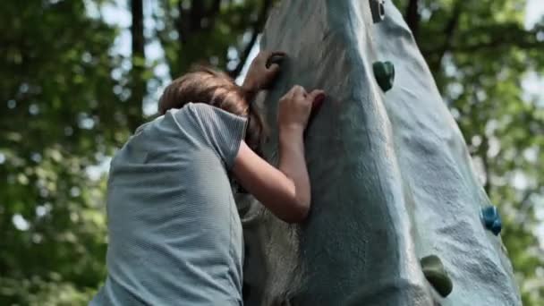 Caucasian Elementary Boy Climbing Playground Sunny Day Shot Red Helium — Stockvideo