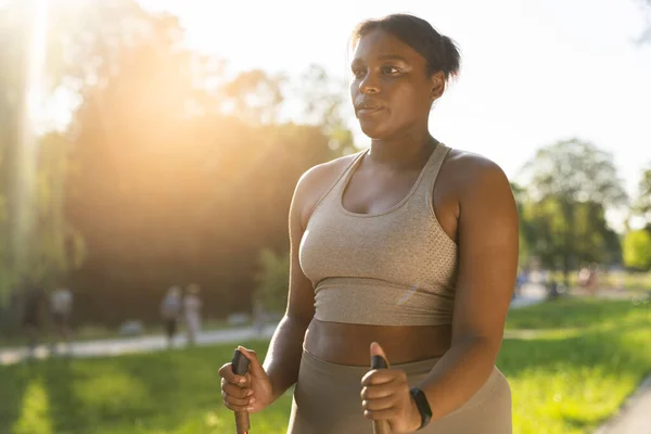 Focus Young African American Woman Exercising Nordic Walking Park Summer — Stock fotografie