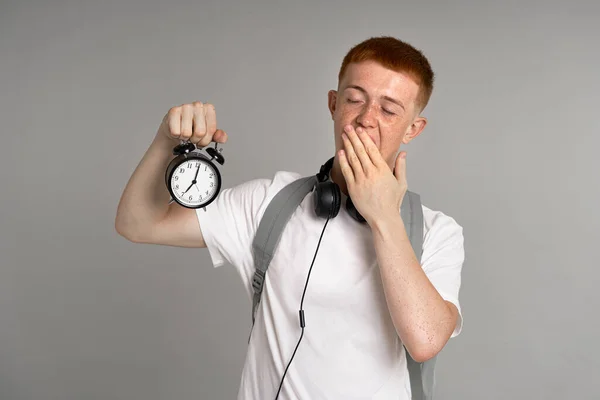 Overslept Male Student Clock Hand Grey Background — Stok fotoğraf