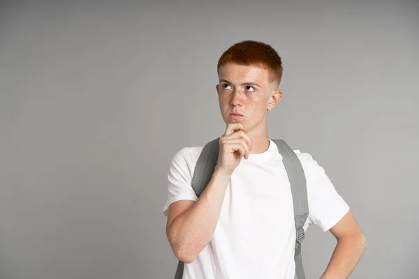 Young Ginger Male Student Thinking Something — Stock fotografie