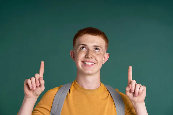 Close Ginger Teenage Boy Pointing Copy Space — Foto Stock