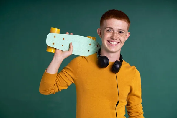 Portrait Smiling Ginger Male Student Holding Skateboard — 图库照片