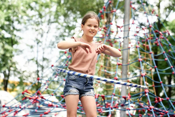 Smiling Girl Playing Plastic Hop Playground — Stockfoto