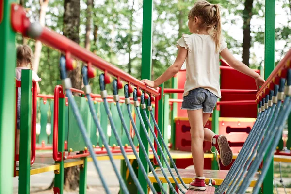 Rear View Girl Playing Playground Summer Day — Zdjęcie stockowe