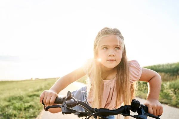 Portrait Little Caucasian Girl Sitting Bike Sunset Time — 스톡 사진