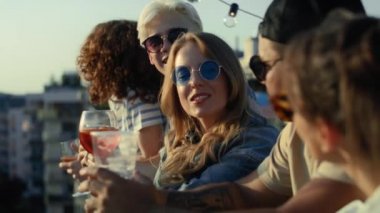 Group of multi ethnicity friends at the party in top of the roof. Shot with RED helium camera in 8K.