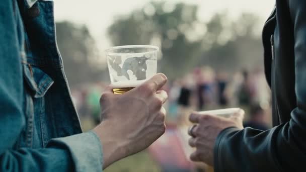 Close Unrecognizable Man Holding Disposable Cup Beer Shot Red Helium — Stockvideo