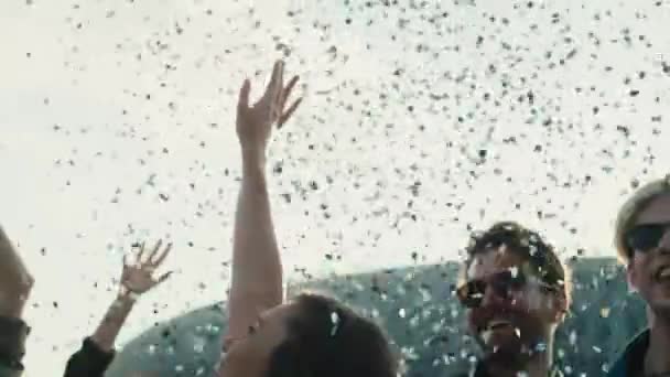 Young Caucasian Friends Dancing Confetti Music Festival Hands Shot Red — Wideo stockowe