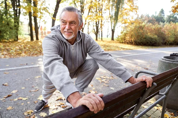 Senior Caucasian Man Stretching Park — Fotografia de Stock