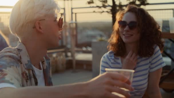 Caucasian Couple Talking Together Roof Top Party Sunset Shot Red — Wideo stockowe