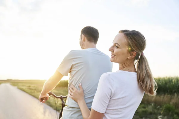 Rear View Caucasian Couple Having Fun One Bike Village Road — Foto de Stock