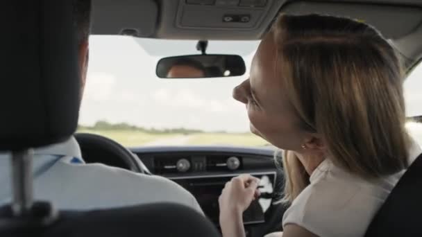 Back View Cheerful Caucasian Middle Age Couple Car Trip Shot — Wideo stockowe