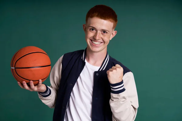 Successful Caucasian Red Head Boy Holding Basketball Ball Looking Camera — Stockfoto