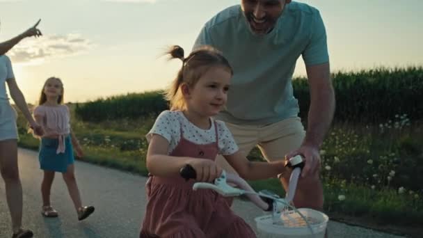 Family Four Caucasian People Spending Time Walking Riding Bike Village — Stok video