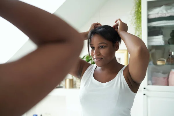 African American Woman Checking Hair Condition Bathroom — Fotografia de Stock