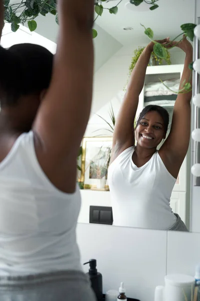 African American Woman Standing Domestic Bathroom Stretching — Stock Photo, Image