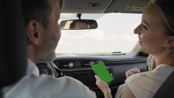 Rear View Middle Age Caucasian Couple Driving Car Using Map — Vídeos de Stock