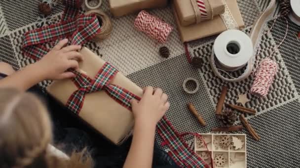Top View Caucasian Little Girl Wrapping Christmas Gifts Floor Shot — Stock Video