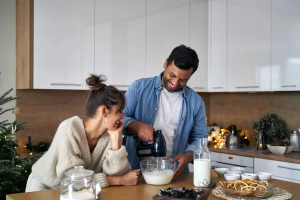 Multi Ethnicity Couple Making Cake Christmas Time — Stock Photo, Image