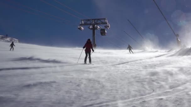 Winter Ski Slope Sunny Day Snow Dust Flies Surface Skiers — Αρχείο Βίντεο