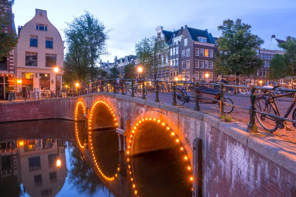 Netherlands Stone Bridge Three Arches Amsterdam Canal Lots Parked Bikes — Stock Photo, Image